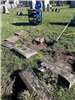 Photo of headstones that were buried under the sod in Youngs Cemetery - 2nd view