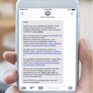 An image of a mobile device with a sample text message from BCPD's new SPIDR Tech system.