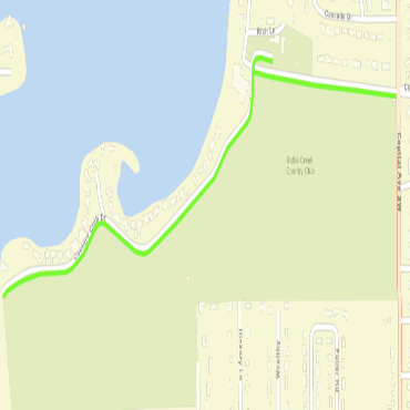 A city street map showing tree removal work along Country Club Drive as a green line.