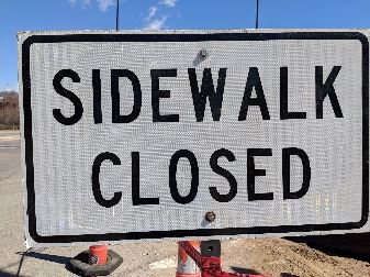 sidewalk closed sign
