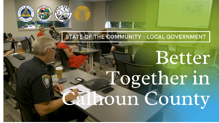 People in a meeting, promoting local government State of the Community event