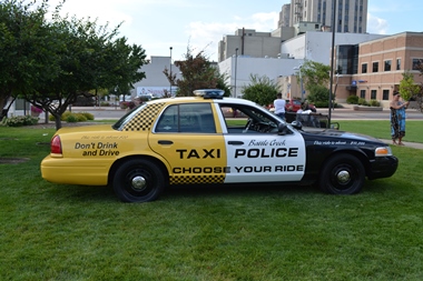 Police cruiser and taxi